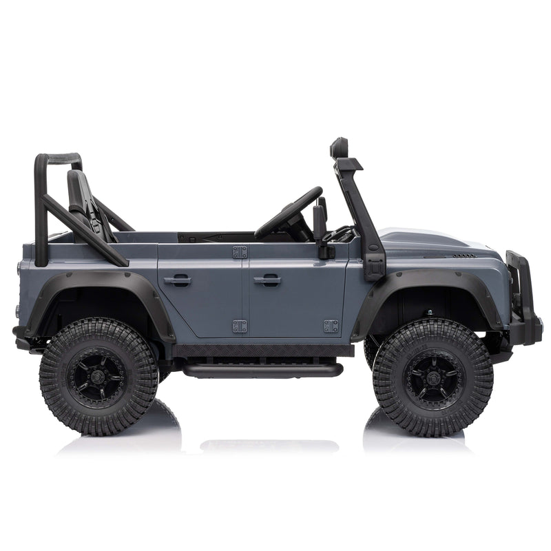 a grey kids ride on electric land rover defender jeep with a parent remote control 