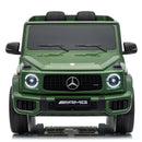 A green Mercedes-Benz AMG G-Class style ride-on toy car, photographed from the front on a clean white background.