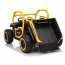 Yellow and black UTV toy with a black bed on a white background