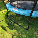 Blue trampoline with a ladder on a grassy area