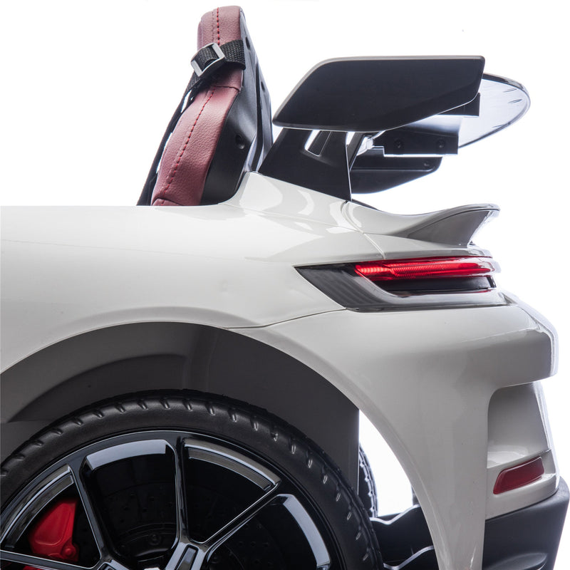 a white ride on porsche 911 gt3 with 2 seats for kids to drive