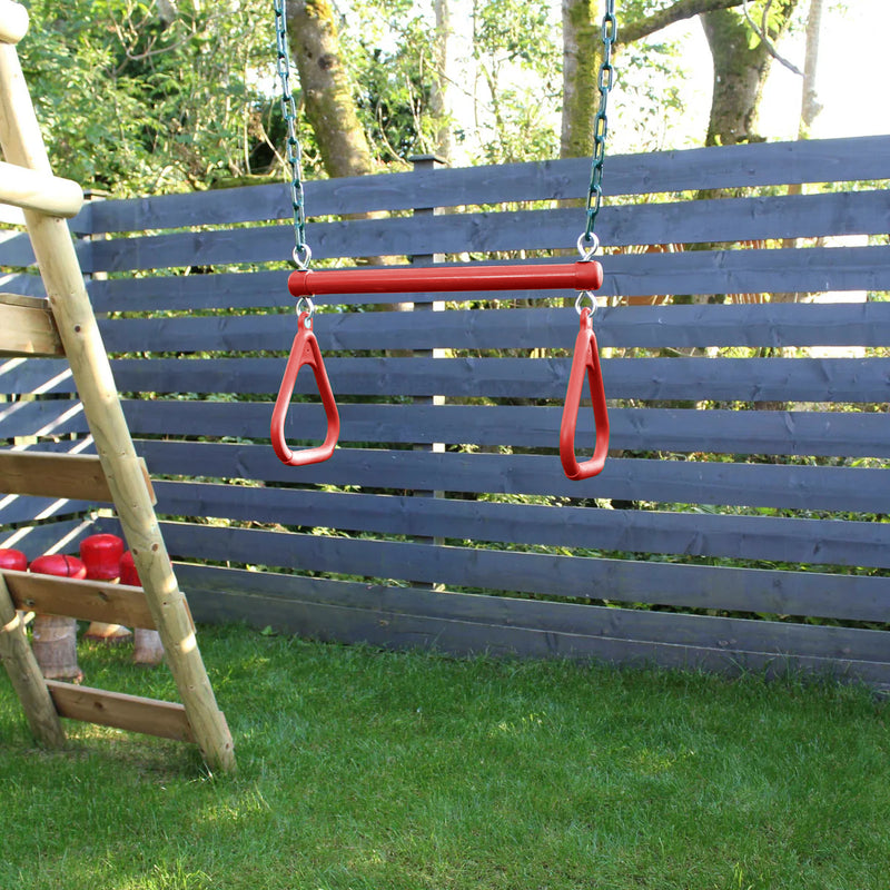 red children's trapeze bar swing with hanging rings