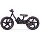 A black balance bike with rugged tires, a central battery pack, and a padded saddle, shown in a side profile on a white background.