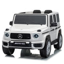 A white Mercedes-Benz G-Class style ride-on toy car with black trim, black seats, and AMG branding on the front grille and bumper, photographed on a clean white background.