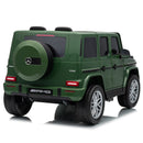 A green Mercedes-Benz AMG G-Class toy SUV with a spare tire on the back, shown from a rear three-quarter angle on a white background. its for kids ti ride 