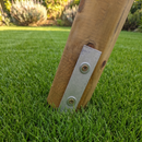 metal ground anchors for wooden swing poles that get secured into concrete