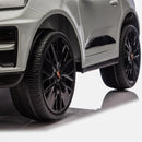 a grey porsche jeep for kids to sit inside and drive 